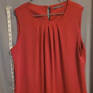 Dark pink in color sleeveless shirt